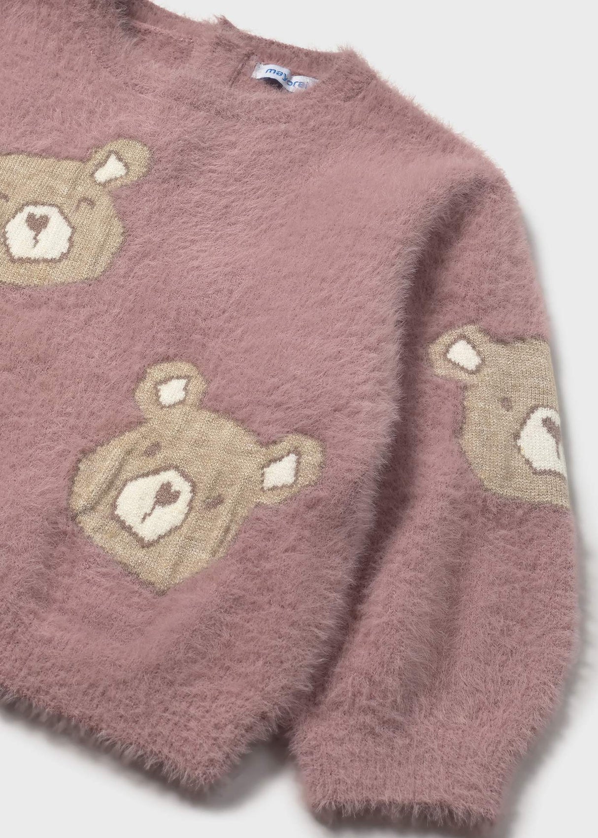 Close-up of knit fabric and intarsia woven design