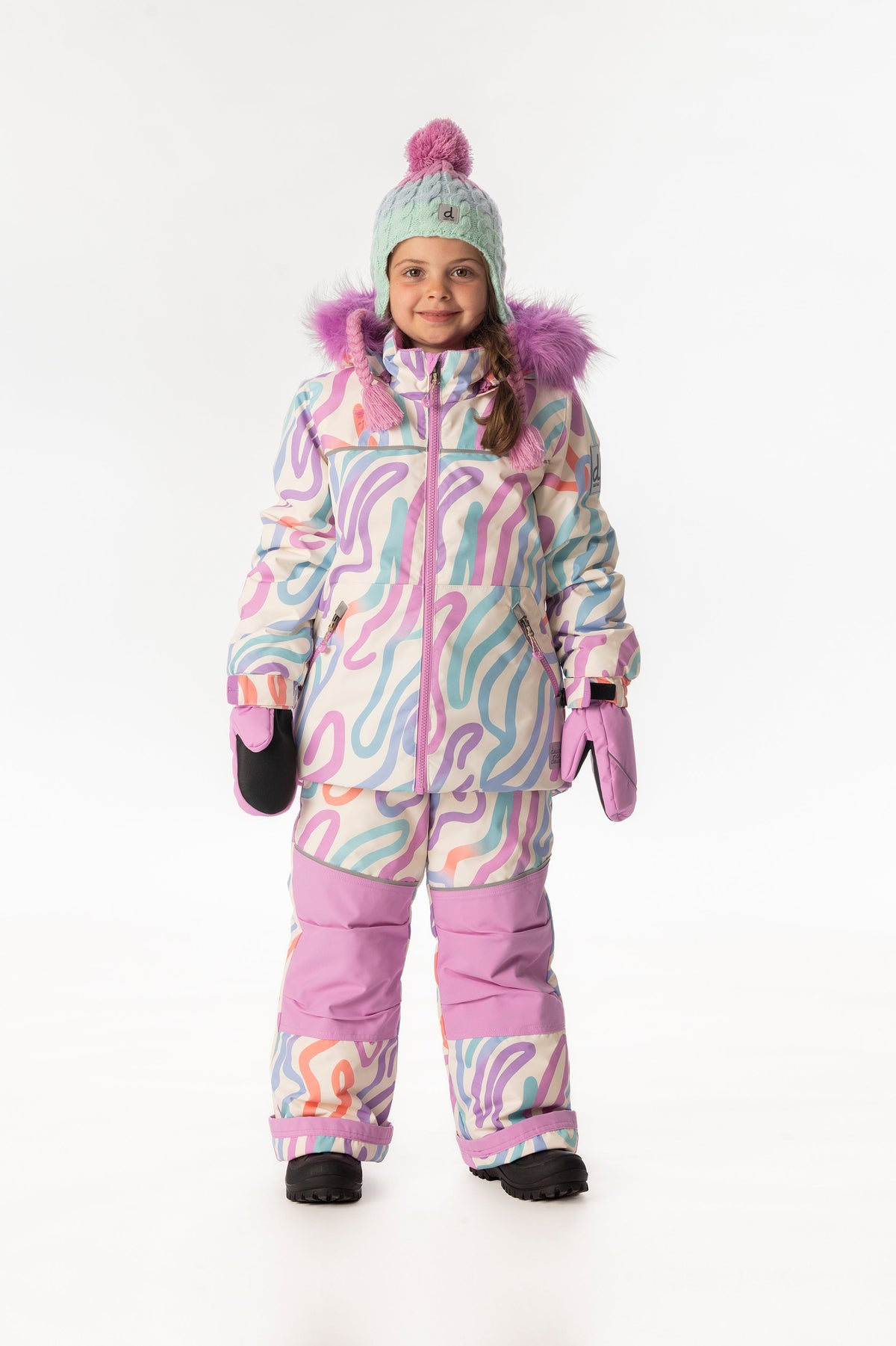 Child wearing the multicolored line print Deux par Deux DISCOVER snowsuit, full-length front view