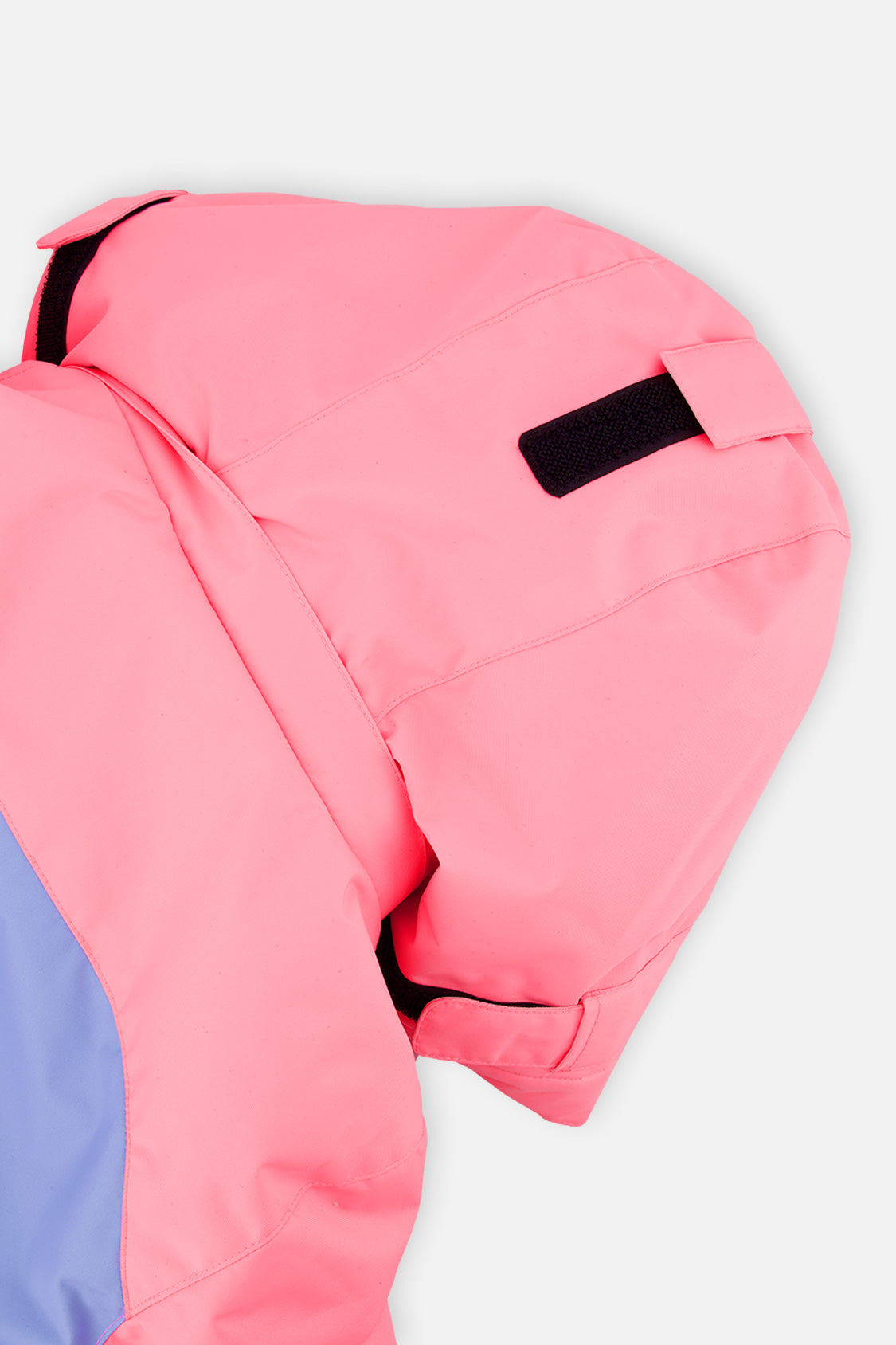 Close-up of the pink PLAY jacket hood