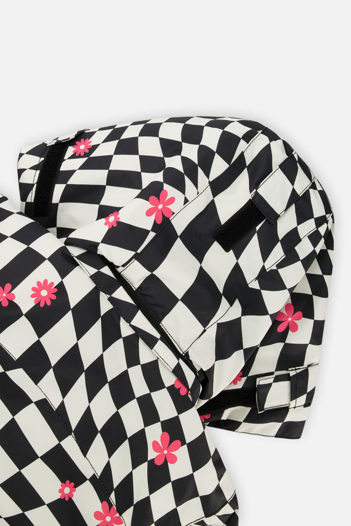 Deux par Deux girls' TEKNIK two-piece snowsuit in bright pink checkered print, further studio view