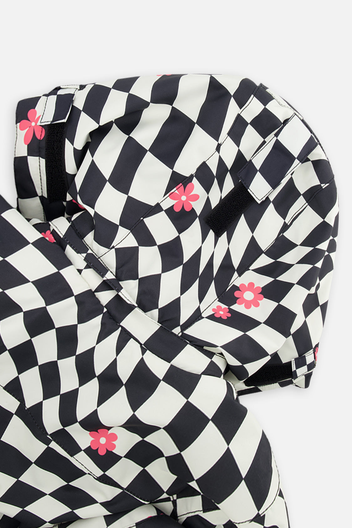 Deux par Deux girls' TEKNIK two-piece snowsuit in white and bright pink checkered print, further studio view