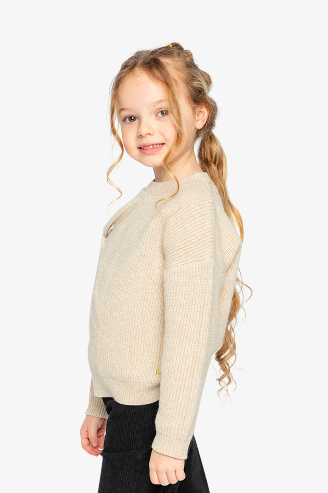 Child wearing the Deux par Deux beige sweater with bow, third lookbook shot
