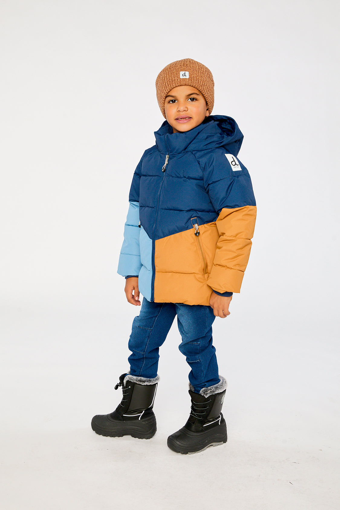 Child wearing the Deux par Deux dark blue color-block winter jacket, view 2
