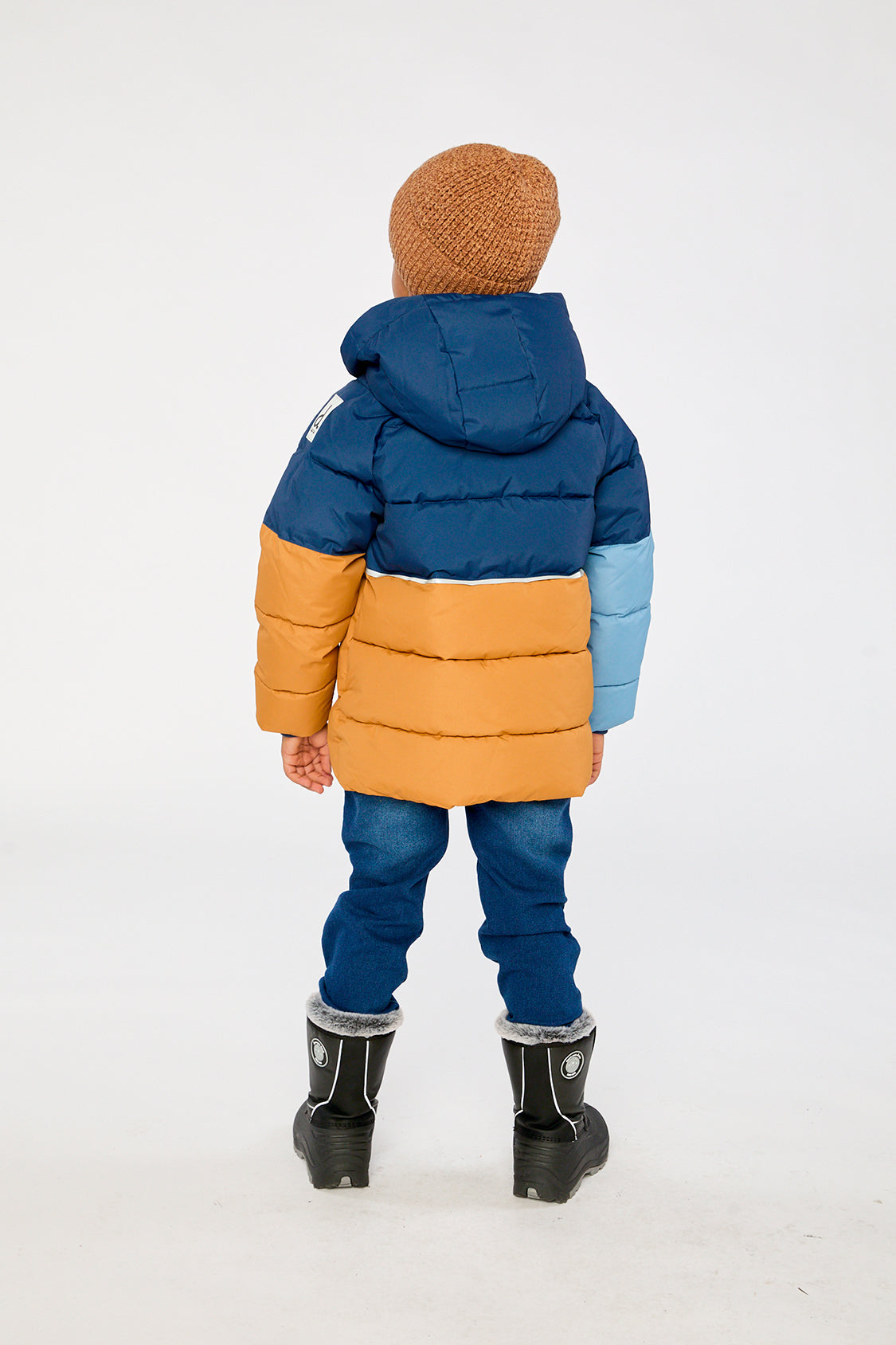 Child wearing the Deux par Deux dark blue color-block winter jacket, view 3