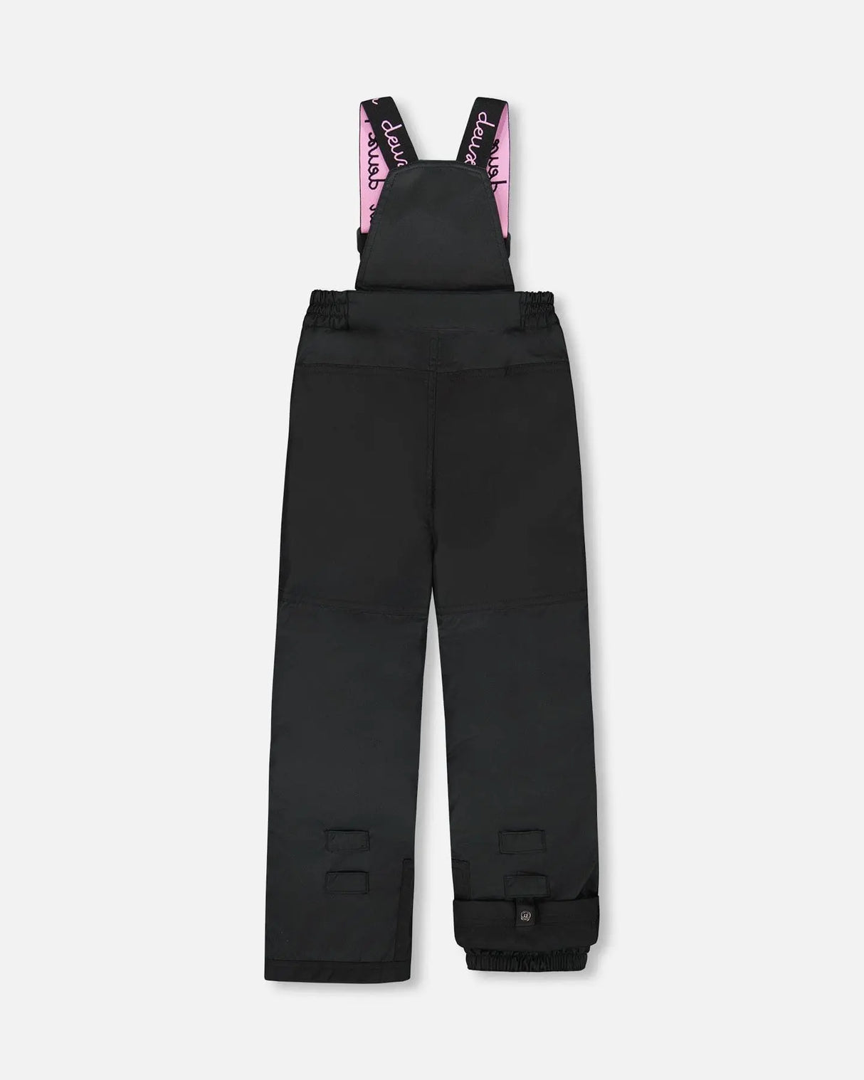 Black bib pants with Cordura knees and ankle gaiters — girls jacket and snow pants.