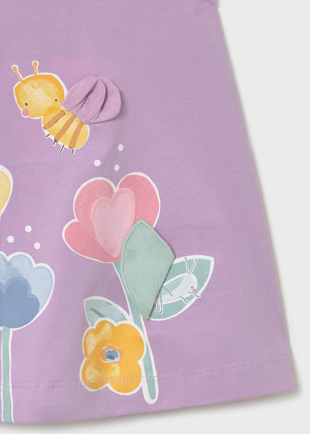 Detail view of colorful front artwork on Mayoral baby girl cotton dress.