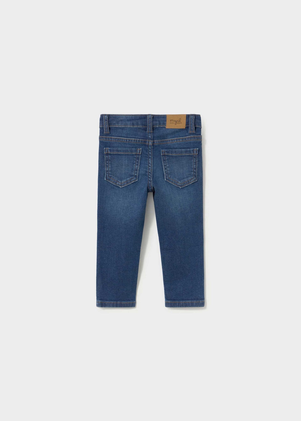 Back view of Mayoral baby boy Dark Blue slim fit jeans with classic denim pocket styling.
