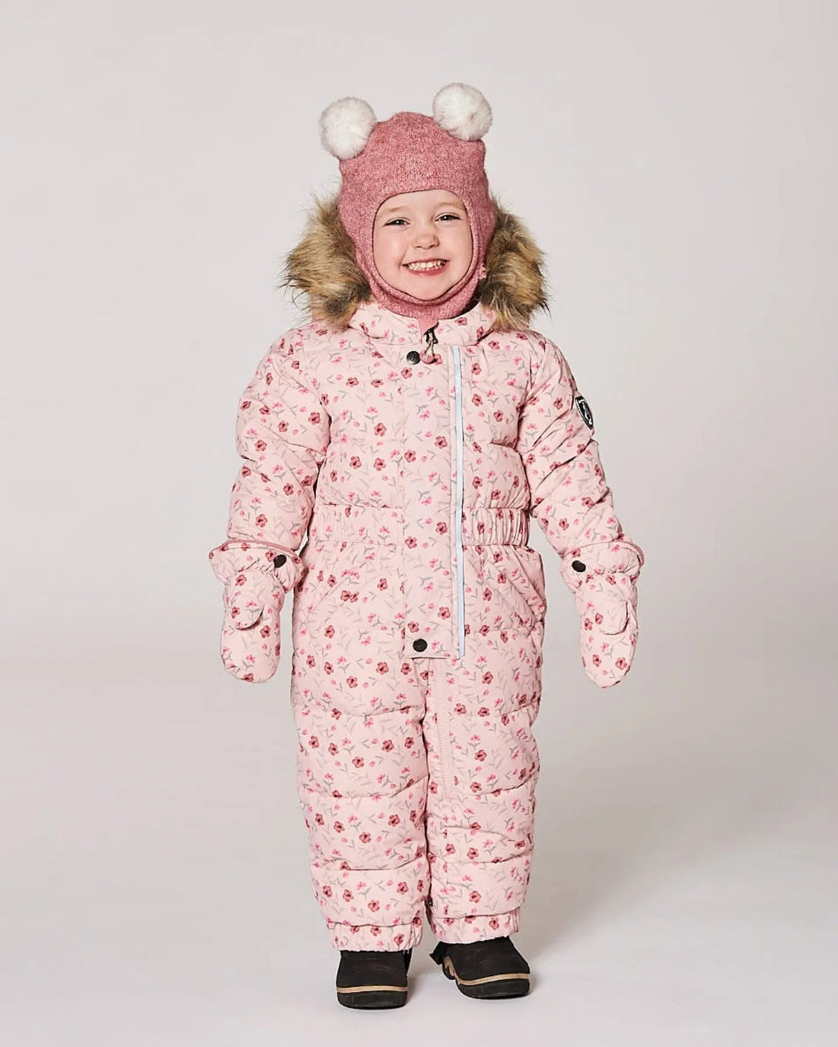 Baby girl wearing pink mini flowers puffy snowsuit front view