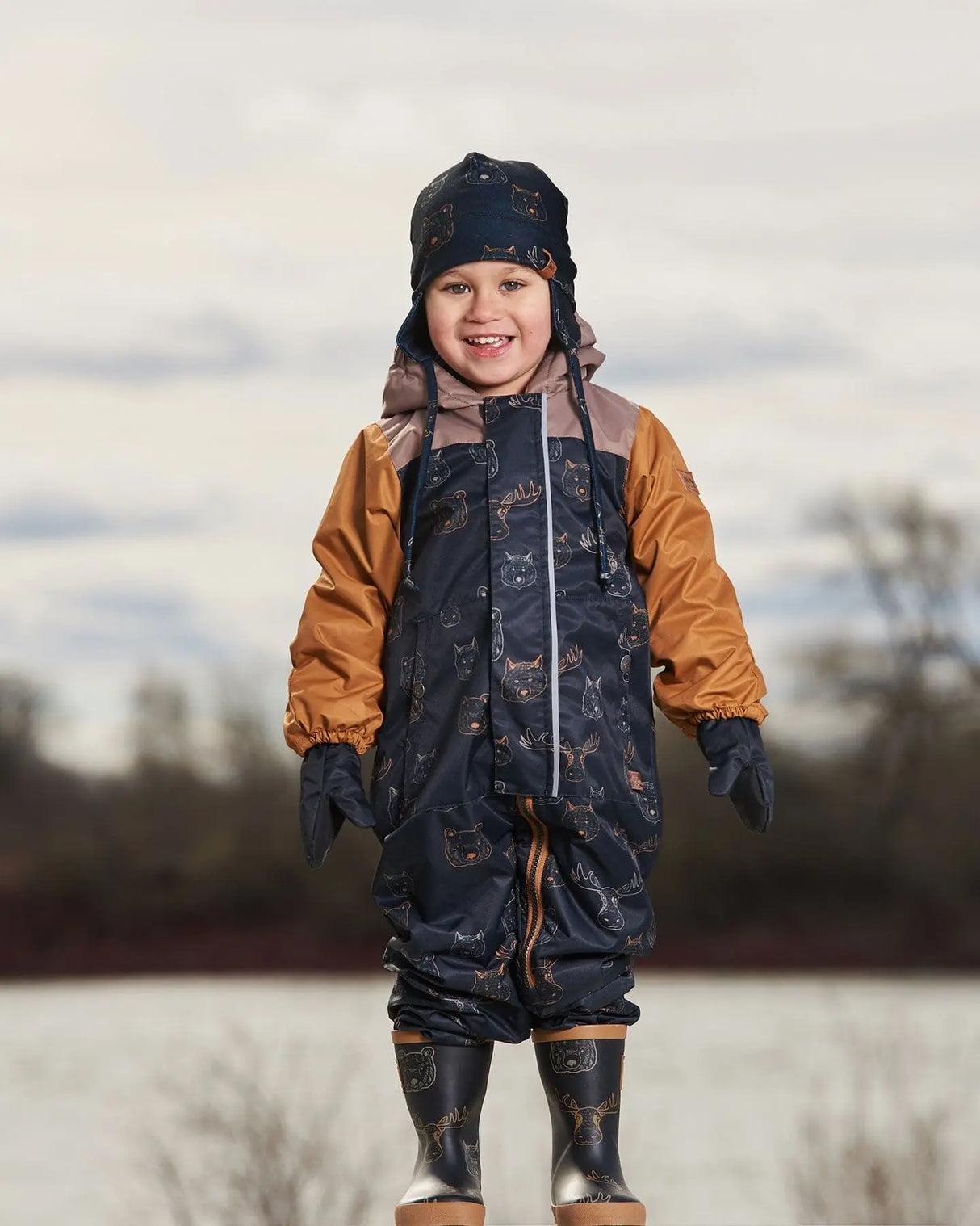 Baby Printed Mid-Season One-Piece Outerwear With Hat Beige Animals On Black Background | Deux par Deux | Jenni Kidz