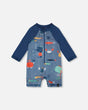 Front flat lay of Deux par Deux baby boy long sleeve one-piece swimsuit in blue marine animals print
