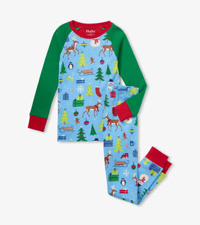 Hatley boys Blue Christmas Raglan organic cotton pajama set with green sleeves and red trim.