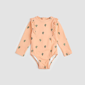 Miles The Label toddler girls Apricot cactus long-sleeve swimsuit with UPF 50+ and ruffle detailing.