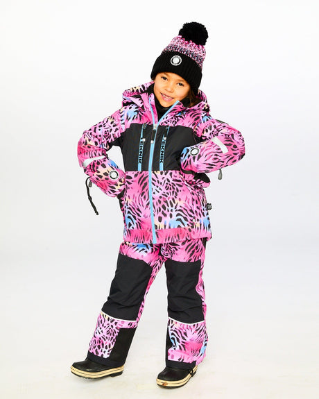Child wearing Deux par Deux multicolor leopard & zebra snowsuit outdoors – shop now