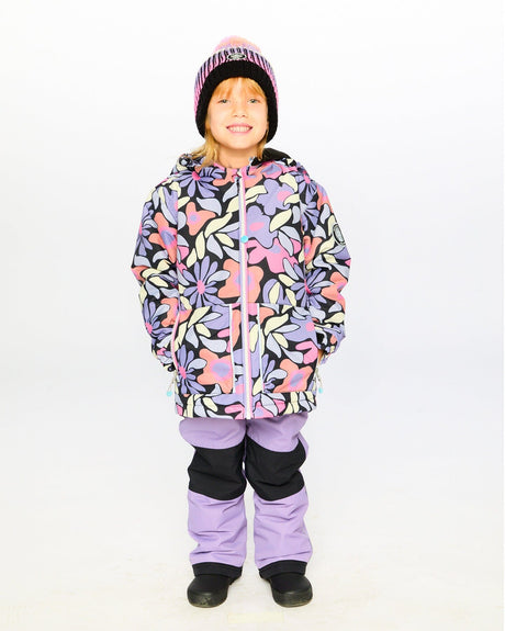 Child wearing Deux par Deux purple gray chill snowsuit outdoors – order now