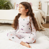 Child wearing orchid pink gamer girl print organic cotton pajama set by Petit Lem