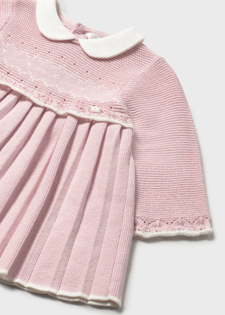 Close-up of jacquard fabric and baby collar on Mayoral dress