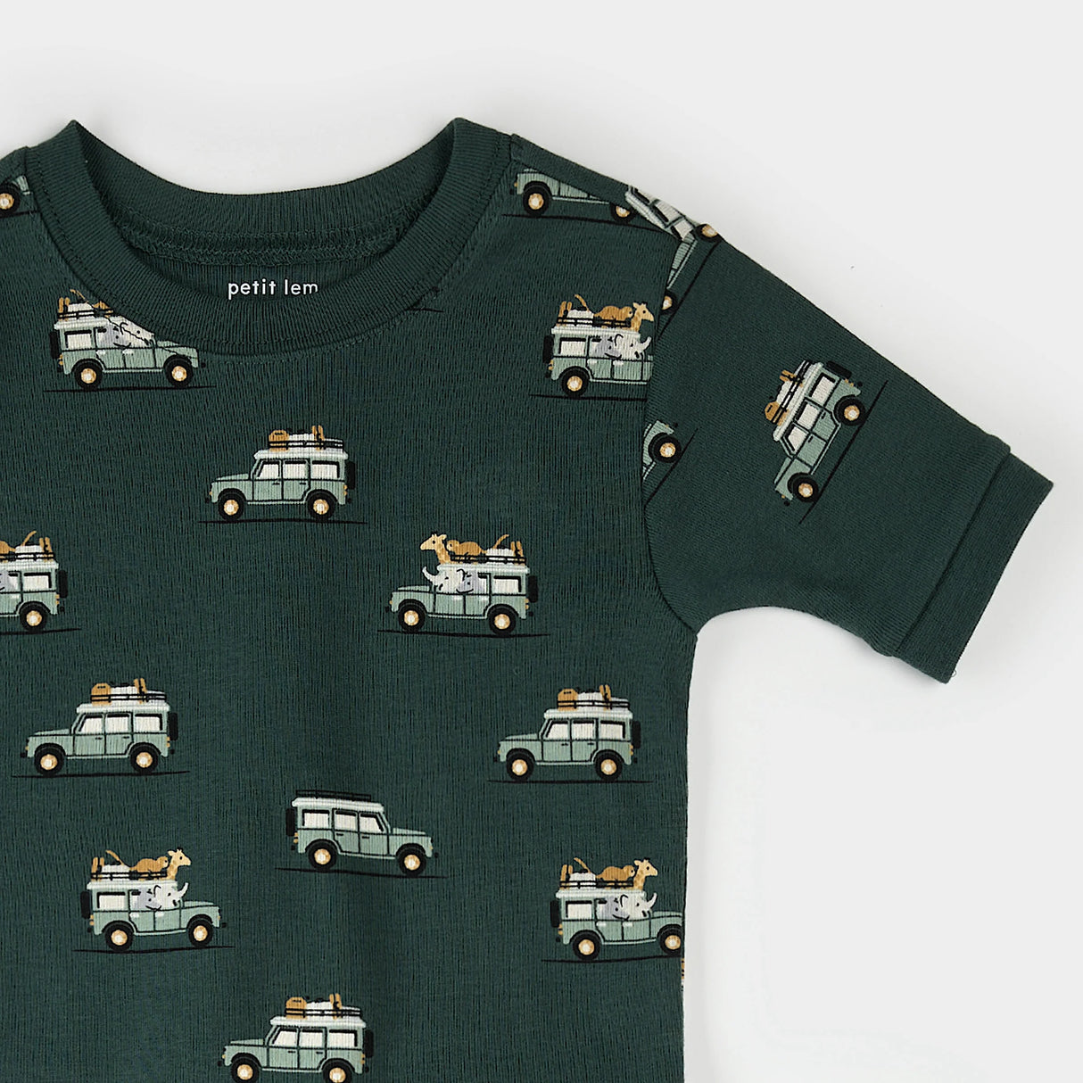 Close-up of safari jeep print on organic cotton kids summer sleep set