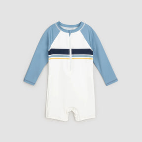 Miles The Label baby boys Blue/White color block long-sleeve swim romper with UPF 50+ and front zipper.
