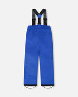 Detail of fleece-lined hood and waterproof seams on Deux par Deux blue snowsuit