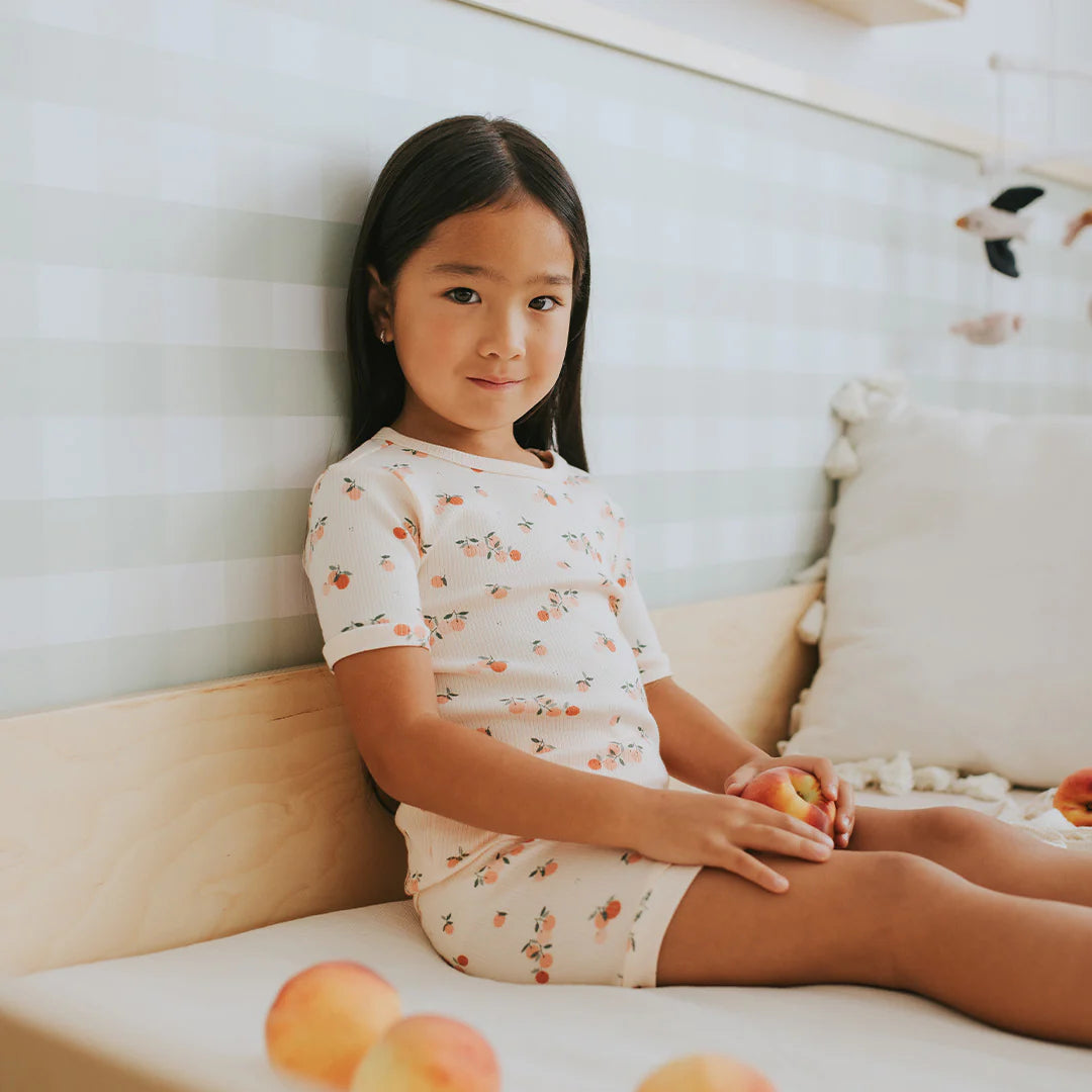 Floral print organic cotton kids pajama set close-up Petit Lem