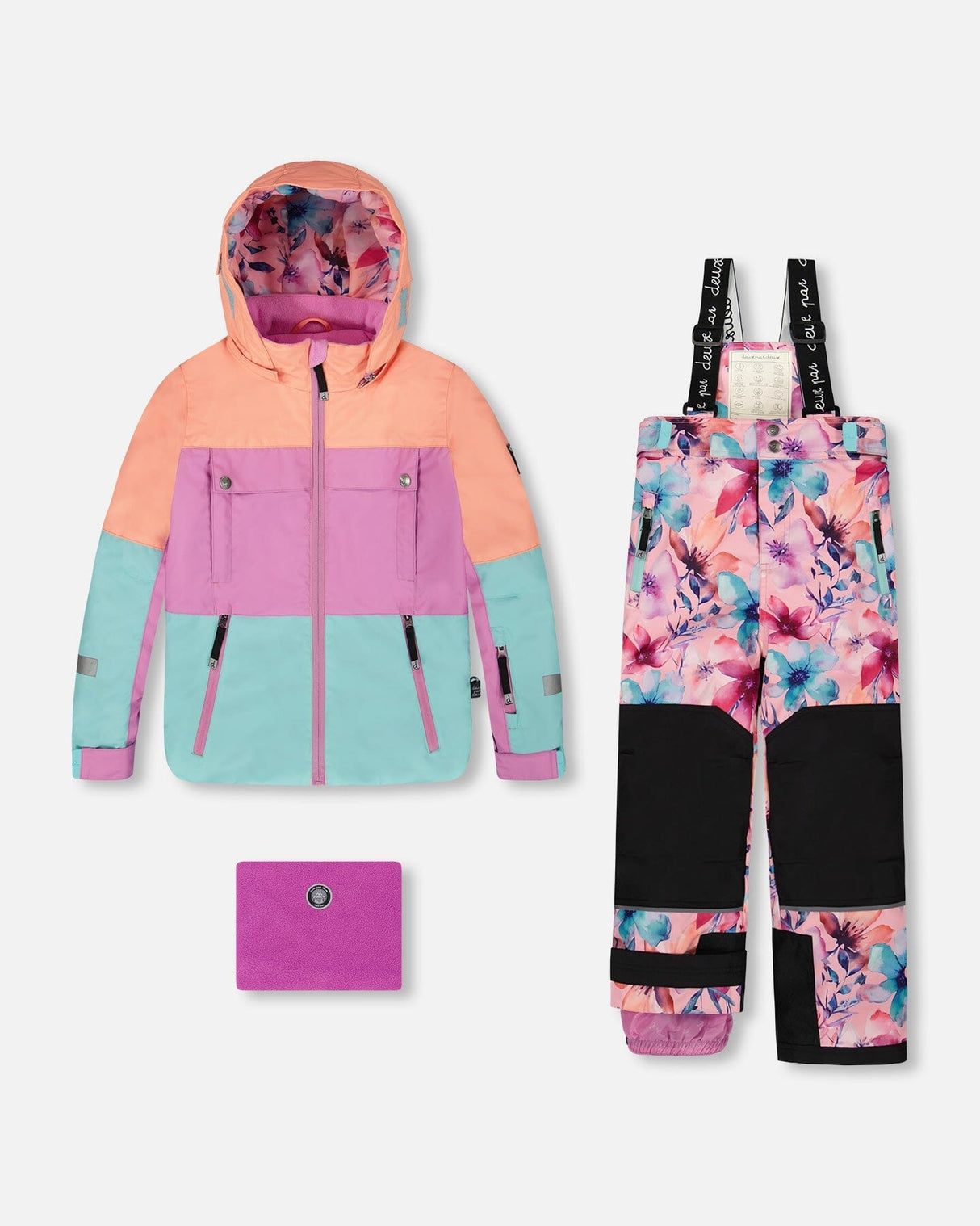 Front flat lay of colorblocked jacket with pink watercolor flower bib pants — Deux par Deux two-piece snowsuit