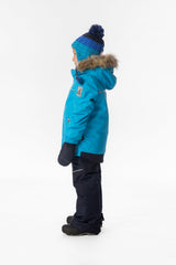 Boy in the bright blue and navy Deux par Deux DISCOVER snowsuit, side view