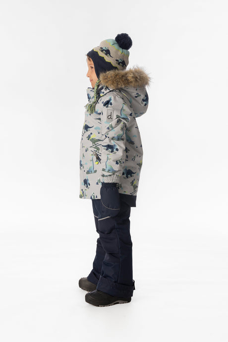 Boy in the grey dinosaur print Deux par Deux DISCOVER snowsuit, side view