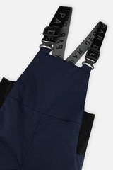 Deux par Deux boys DISCOVER snowsuit, grey dinosaur print – close-up of the bib and suspender buckles