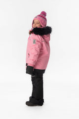 Girl in the pink and black Deux par Deux DISCOVER snowsuit, side view