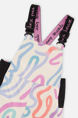Close-up of the line print bib with Deux par Deux suspenders and buckles