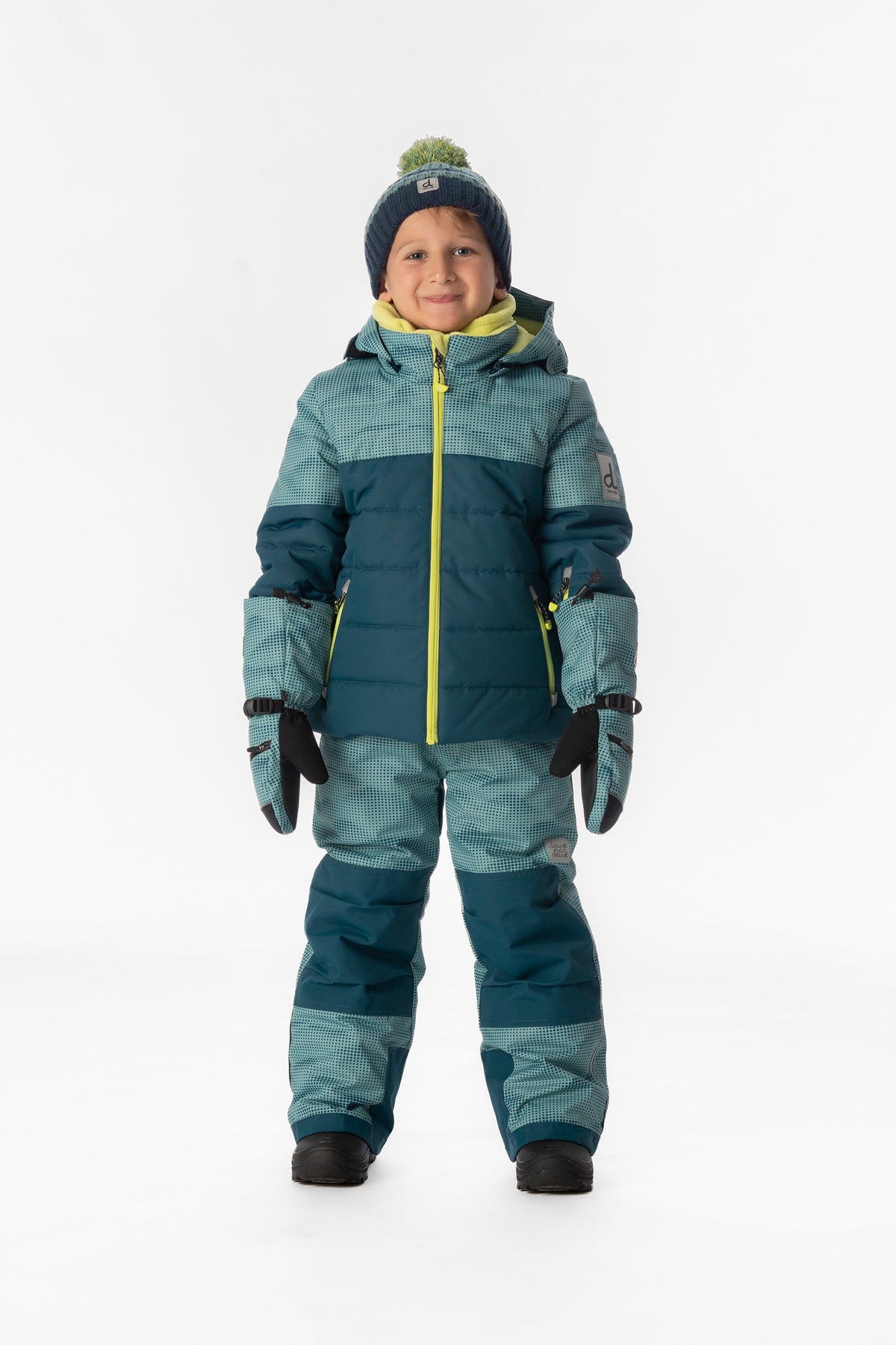 Child wearing the greyish blue and navy Deux par Deux PLAY snowsuit, full-length front view