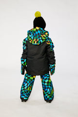 Child wearing the Deux par Deux black colorblock PLAY snowsuit with checkerboard pants, lookbook photo 3