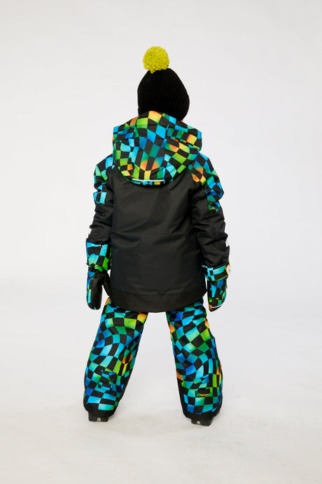 Child wearing the Deux par Deux black colorblock PLAY snowsuit with checkerboard pants, lookbook photo 3