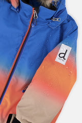 Deux par Deux boys' PLAY snowsuit, blue and orange gradient jacket with black pants, additional studio angle