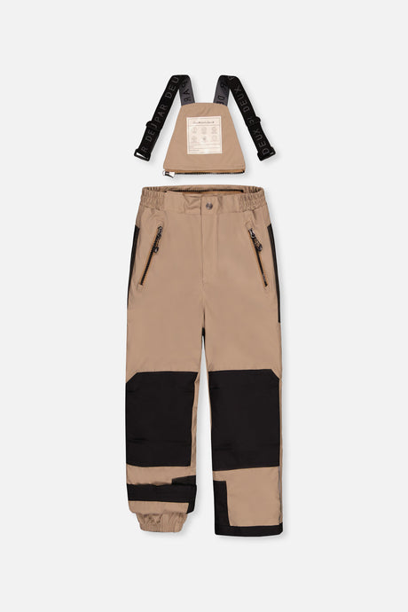 Deux par Deux beige PLAY bib snow pants with suspenders and black reinforced knees, front view
