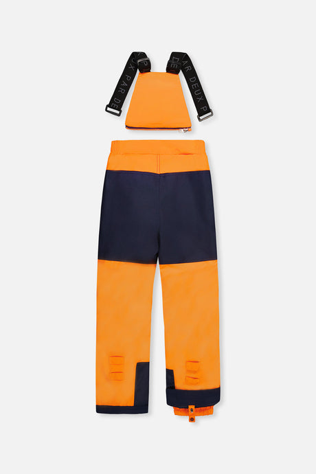 Back view of the orange snow bib pants with navy reinforced seat
