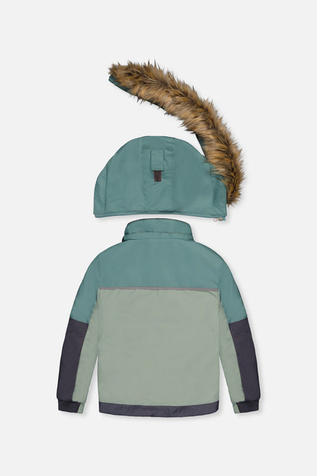 Deux par Deux green and navy colorblock PLAY jacket, back view with faux-fur hood detached