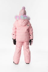 Girl in the light pink Deux par Deux PLAY snowsuit, back view