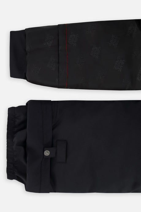 Deux par Deux girls PLAY snowsuit, black with leopard faux fur – sleeve and pant hem extensions for growing room