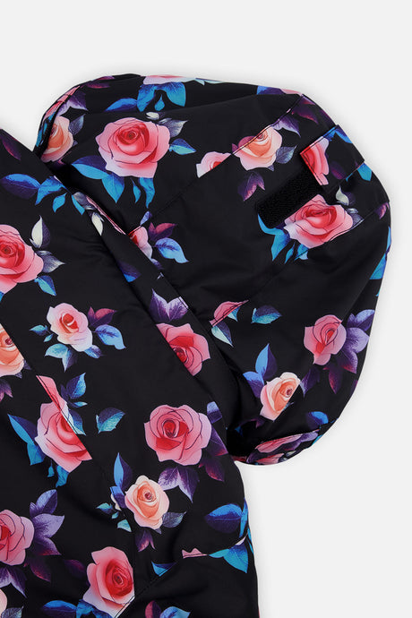 Close-up of the black rose-print PLAY jacket hood and shoulder