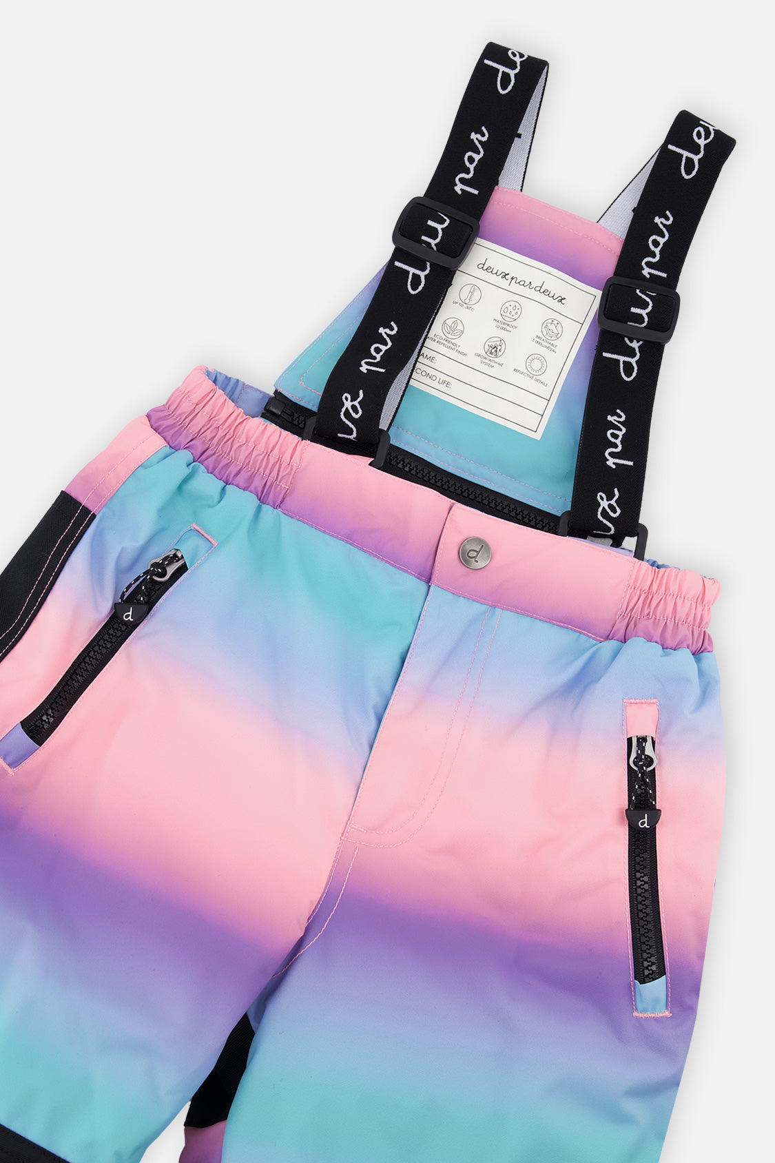 Close-up of the gradient snow pants suspenders and zippered pocket