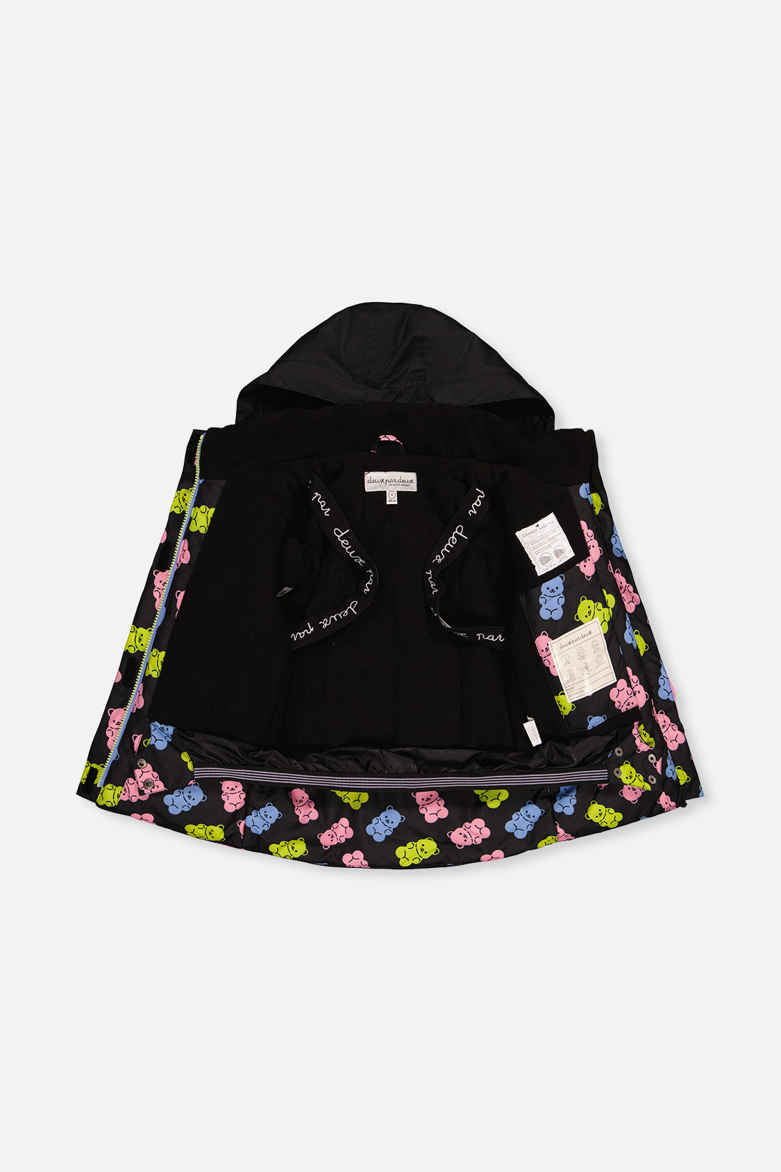 Gummy bear print jacket opened to show the black fleece lining and inner straps