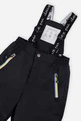 Close-up of the black snow pants suspenders and zippered pocket
