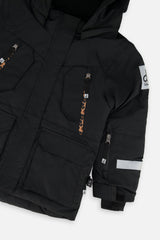 Deux par Deux girls' Teknik two-piece snowsuit, black jacket with leopard print pants – jacket detail close-up