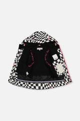 Deux par Deux girls' TEKNIK two-piece snowsuit in white and bright pink checkered print, additional angle