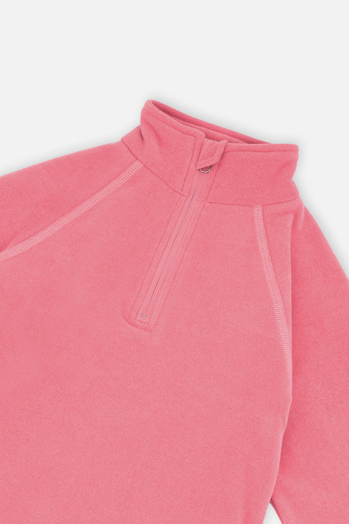 Close-up of the half-zip mock neck and raglan seams on the pink thermal underwear top
