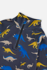 Close-up of the half-zip collar and blue, mustard yellow and beige dinosaur print on the thermal underwear top