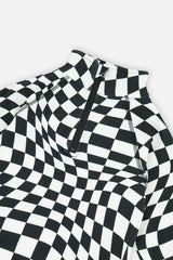 Close-up of the half-zip neck and wavy checkered print on the black and white Deux par Deux thermal underwear top