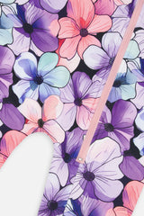 Close-up of the lilac, pink and aqua flowers and the pale pink zipper on the one-piece