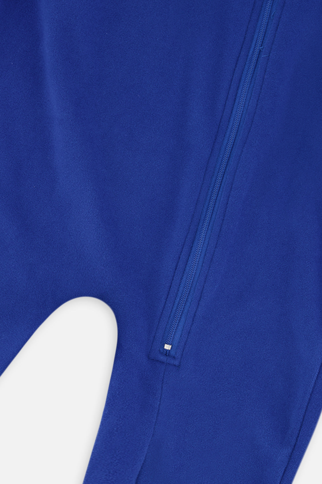 Close-up of the royal blue zipper running down to the leg of the one-piece thermal underwear